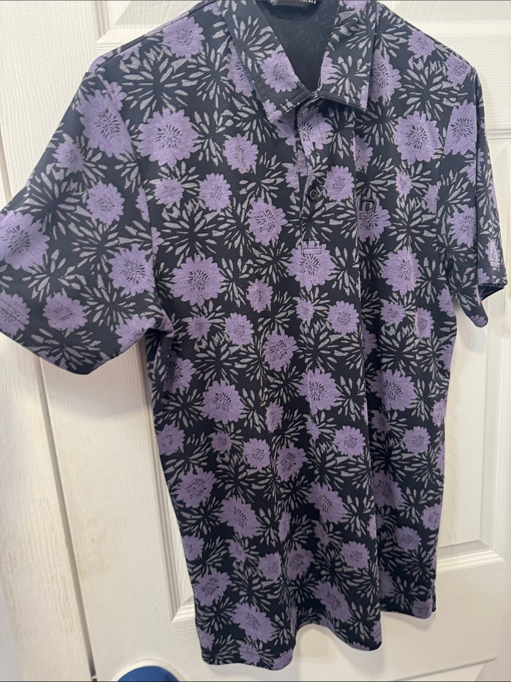 Travis Mathew Black Polo with Purple Floral Print